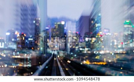Motion blurred bokeh light city downtown double exposure, abstract background