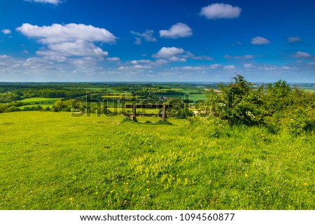 A bright beautiful day in May and a walk from the village of Wye in Kent up the north downs with amazing views of the countryside Royalty-Free Stock Photo #1094560877