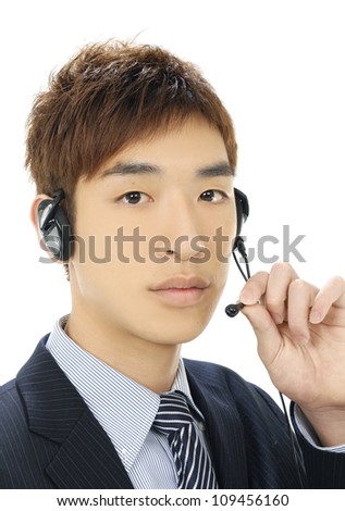 attractive young businessman with a headset