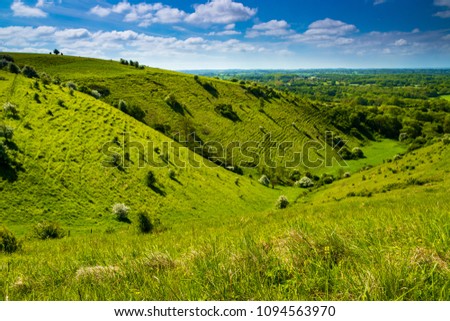 A walk around the north downs in Kent in May from the village of Wye with views of the  devils kneeding trough Royalty-Free Stock Photo #1094563970