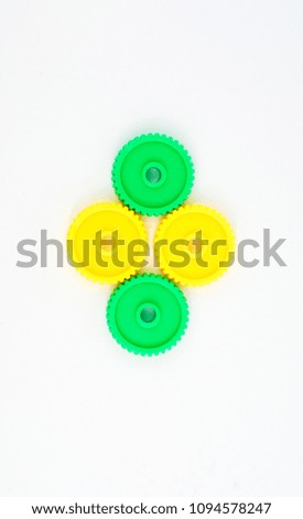 Gear made from plastic on white background