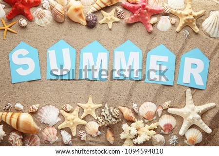 Inscription Summer with seashells on beach sand