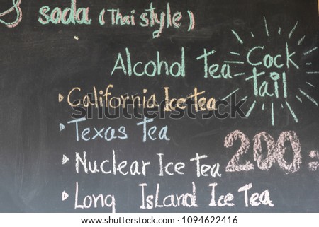 Blackboard writing of alcohol with chalk.