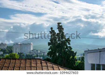 cityscape with mountains