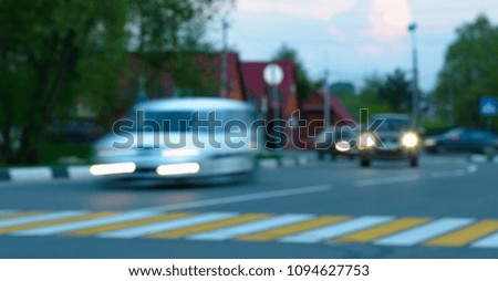 blur picture of a car rides around the city abstract background