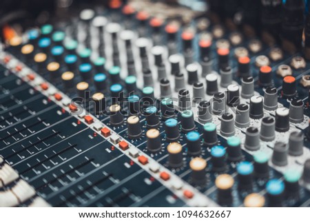 Buttons and knob switches of audio mixer control panel or sound editor, cinematic tone. Digital music technology, concert event, DJ instrumental equipment, movie theater or television industry concept