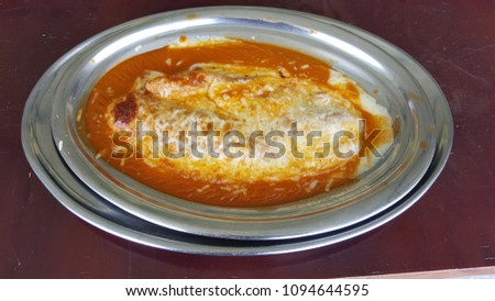 cod fish with tomato sauce and cheese