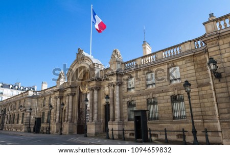 View of entrance gate of the Elysee Palace from the Rue du Faubourg Saint-Honore. Elysee Palace - official residence of President of French Republic since 1848. Royalty-Free Stock Photo #1094659832