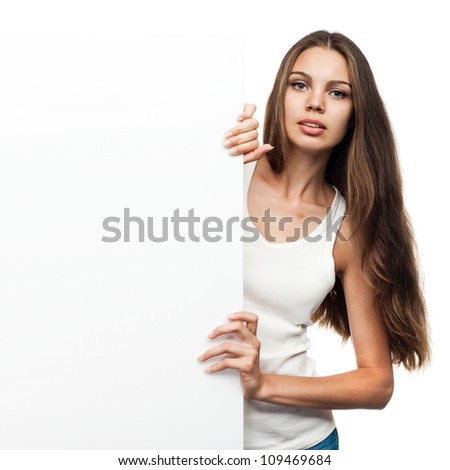 Portrait of a young woman with blank billboard isolated on white background