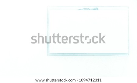 Badge with paper on a bright white background