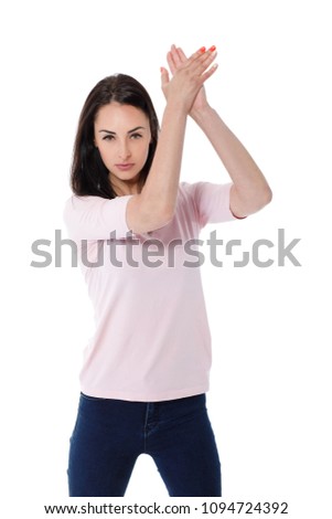 beautiful brunette woman clapping isolated on white background