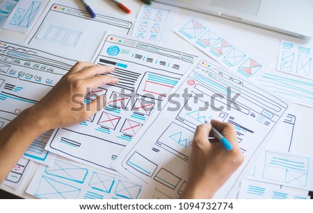 Website designer Creative planning application development  draft sketch drawing template layout framework wireframe design studio . User experience concept .