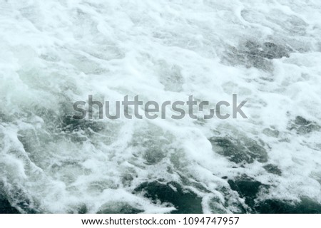Deep dark foaming sea. Waves at the beach, beautiful background