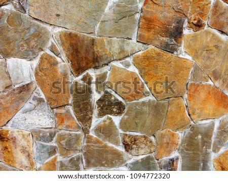 Large paving slabs made of natural stone. Road surface, construction. Tessellated paving slabs.