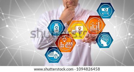 Unrecognizable pharmaceutical research scientist managing prescription drug supply chain via touch screen. Pharma IT concept for SCM, end-to-end fulfillment, serial tracking, freight transportation. Royalty-Free Stock Photo #1094826458