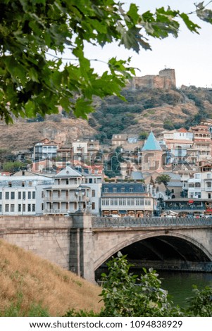 Panoramic view of the bridges over the Kura river in Tbilisi. Summer 2017.