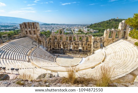 Odeon of Herodes Atticus at Acropolis of Athens, Greece. It is landmark of city. Panoramic view of old theater of Herodes Atticus, monument of Ancient Athens. Concert, travel and Greek culture theme.