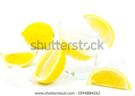 Fresh lemon infused water or soda drinks in glasses, detox water.
