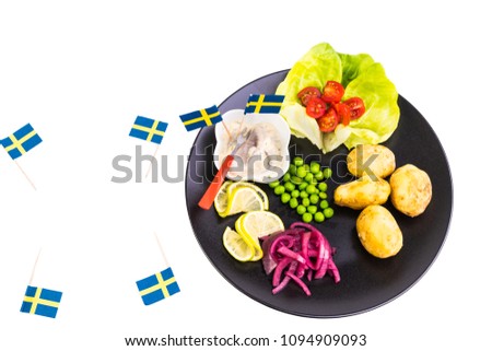 Happy midsummer with herring and potatoes