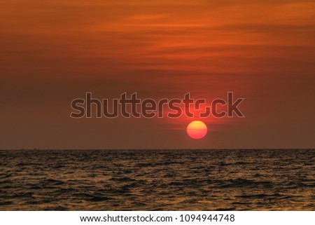 Beautiful sunset with colorful sky in the evening at Layun beach, Layun national park, Thalang district, Phuket Island, Thailand.