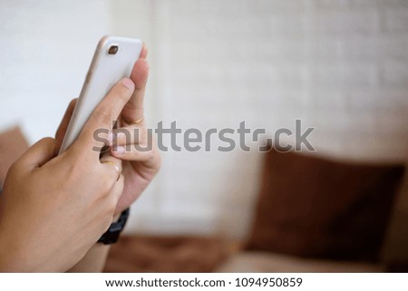 Hand and phone