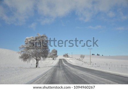 The winter snowy road from Lake Tekapo to Christchurch.You’ll pass through several towns and along farmland, and as you get closer to Tekapo, the scenery will start to become mountainous.