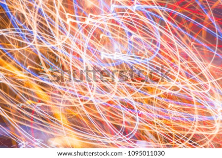 Abstract background of Blurry colorful of motions lights graphic design.