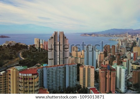 Beautiful view from above. A resort town by the sea. Spain, Benidorm. Skyscrapers on the beach. Vacation in Spain. Panorama. City landscape.