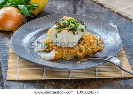 Grilled coriander and lemon cod with carrot pilaf