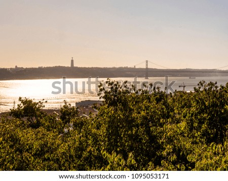 Aerial View Of Downtown Lisbon Skyline Of The Old Historical City And 25 de Abril Bridge (25th April Bridge) from Sao Jorge Castle in Portugal