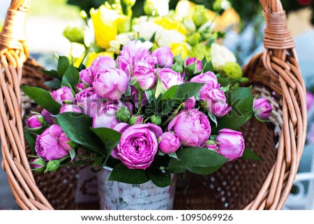 A bouquet of peonies. Beautiful bouquets of flowers on the market. Showcase with flowers. Sale of flowers, shop.