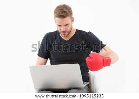 Man with laptop wear boxing glove isolated on white. Bearded man use computer for internet game. Sport bets and gambling online. Internet surfing and virtual world. New technology for modern life.