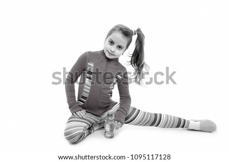 Fitness and health, sport. Workout of small girl isolated on white background. Education and energy. Sport and success. Child in pink sportswear with water bottle