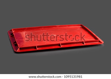 Disposable plastic packaging on a gray background