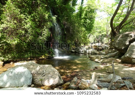 Photo from iconic small waterfall in village of Platanistos, South Evia island, Greece            
