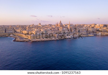 Beautiful aerial sunset view of the Valletta city in Malta. Beautiful city from above with amazing old architecture.