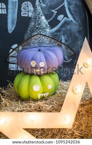 Halloween pumpkin head jack lantern on a Haystack