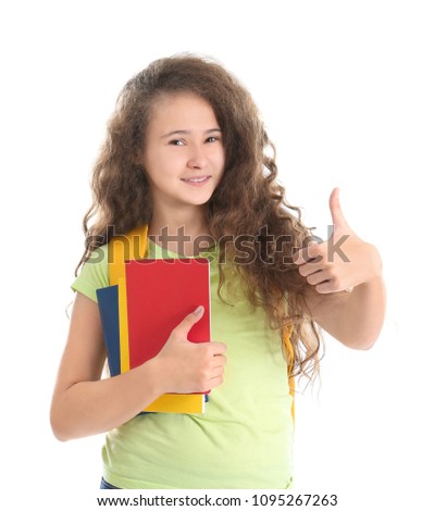 Stylish teenager with books against white background