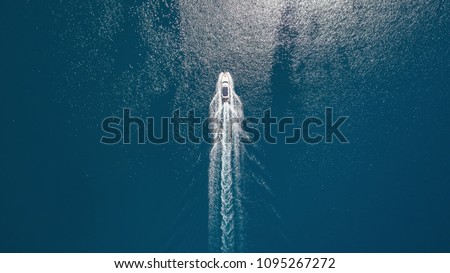 Aerial view on the sea and boat. Beautiful natural seascape at the summer time Royalty-Free Stock Photo #1095267272