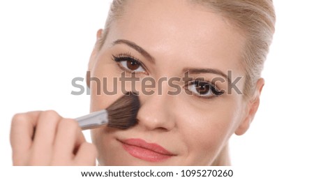 Close Up View of Woman Using Big Brush Paint Self Applying Makeup Cosmetic Powder on her Face