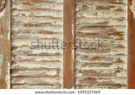 background of old grunge wooden texture with shutters. part of antique old door. For photography product backdrop