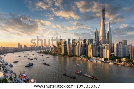 Sunset over the Huangpu river and skyline of Shanghai, China