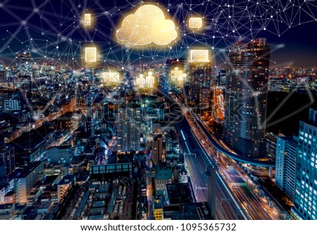 Cloud Computing with aerial view of Tokyo, Japan at night
