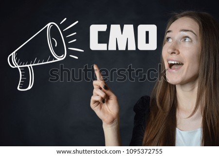 A businessman shows an inscription:CMO