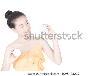 Girl holds the product for presentation. Lady  beautiful  in yellow shirt girl advertising your product on beauty products sign board. Asian female model isolated on white background.