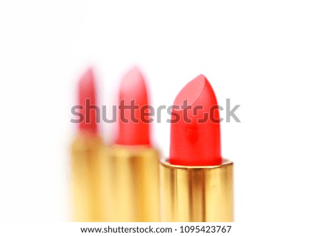 Set of colorful lipsticks for make up, closeup, isolated, abstract, texture, on the white background with empty space for you text