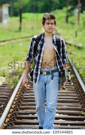 Young man on railroad