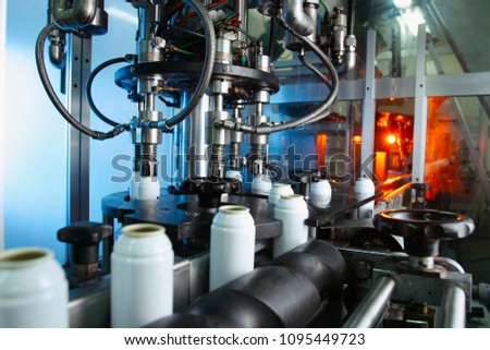 Automatic Filling line for aerosol cans Royalty-Free Stock Photo #1095449723