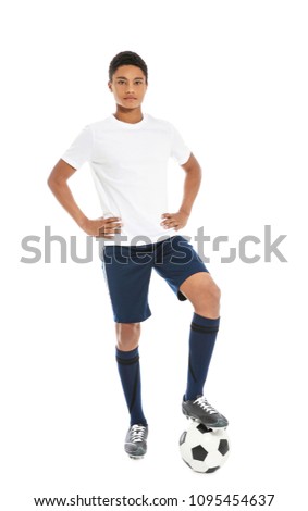 Teenage African-American football player on white background