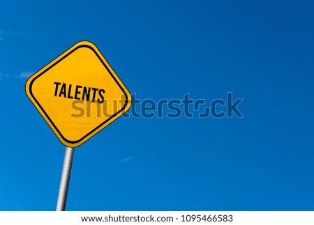 talents - yellow sign with blue sky